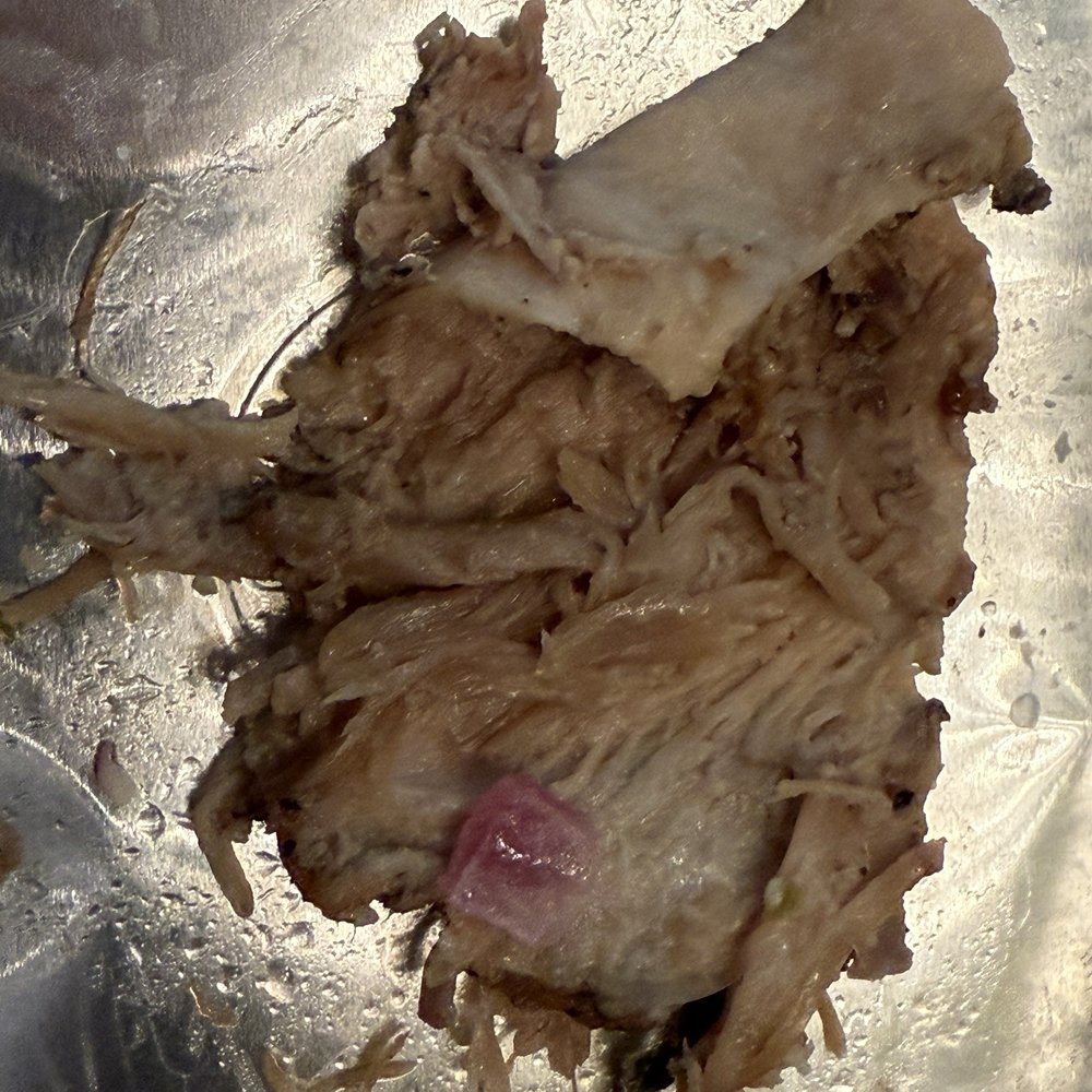 Another view of the gross pork skin in my burrito bowl Another view of the gross pork skin in my burrito bowl