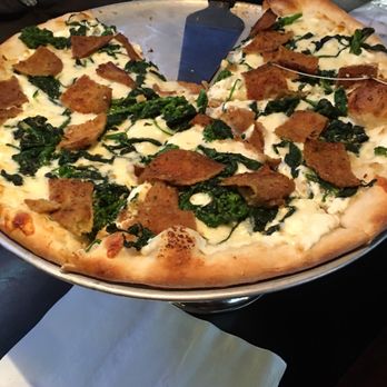 Bella Italia - This Pie is Broccoli Rabe with Fried Eggplant, & Spinach. - Italian Near Me - Raleigh, North Carolina