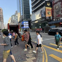 港鐵旺角站 - Another street level entrance and street scene in Mongkok.