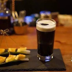 It's such a peculiar drink with charcoal and sesame seed oil, but it goes unexpectedly well with the caramelized  pineapple. Worth a shot.