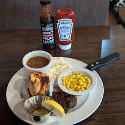 Chuck’s Roadhouse Bar And Grill - Sirloin and lobster tail, with corn, and mashed potatoes with gravy