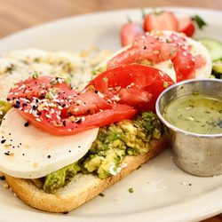 Lemon Tree Café - Avocado Toast~ smashed avocados with lemon, marinated tomatoes, olive oil, (add fresh mozzarella & basil vinaigrette +$2)