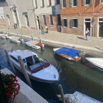 Hotel Tiziano - Outside our window and our water taxi. - Hotels Near Me - Venezia, VE