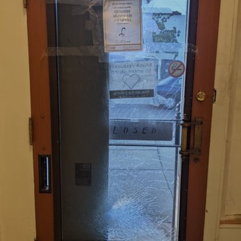 Board & Glass - Before (Glass smashed near bottom - board is holding it in place.) - Glass & Mirrors Near Me