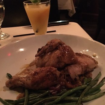 Roaring Fork - Spit-roasted chicken with cornbread stuffing and green beans. - American Near Me - Austin, Texas Roaring Fork - Spit-roasted chicken with cornbread stuffing and green beans. - American Near Me - Austin, Texas