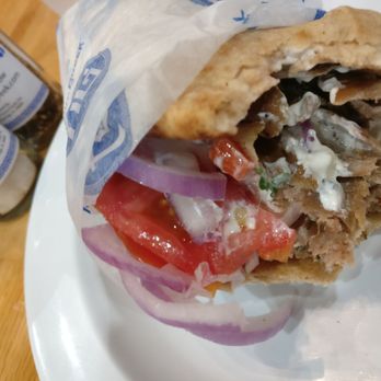 The Hungry Greek - Half eaten gyro...oops, it looked so good I started chowing before I took the pic. - Greek Near Me - Wesley Chapel, Florida