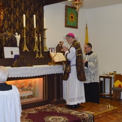 St Francis Assisi Catholic Chapel - The Monsignor reads the Epistle