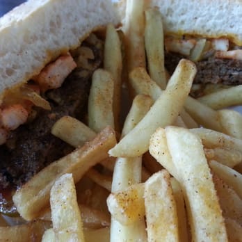ROUL's DELI - Close-up cheese burger and fries. - Burgers Near Me - Baton Rouge, Louisiana ROUL's DELI - Close-up cheese burger and fries. - Burgers Near Me - Baton Rouge, Louisiana
