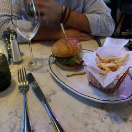Burger was delicious! Would've liked more of that orange wine... Burger was delicious! Would've liked more of that orange wine...
