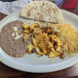 Chorizo breakfast plate with hash browns, beans, flour tortilla. Delicious, quick, and inexpensive.