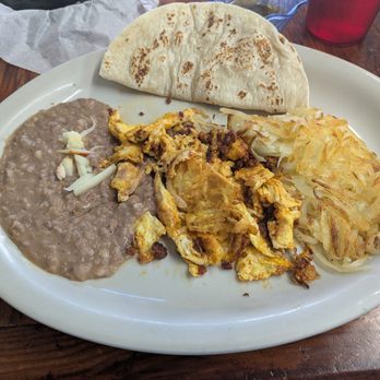 Martha's Cafe - Chorizo breakfast plate with hash browns, beans, flour tortilla. Delicious, quick, and inexpensive. - Mexican Near Me - El Paso, Texas