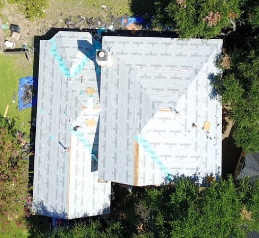 Slide of Greyhound Roofing