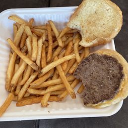 Refried french fries, luke warm 2 oz meat patty,, watered down pop. Is this worth $11, lol.