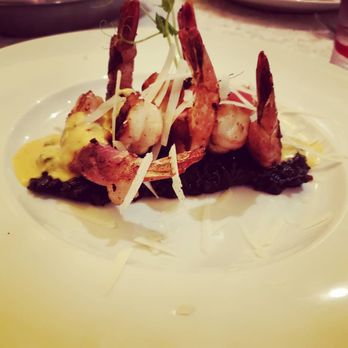 Tramonto - Bacon wrapped shrimp with squid ink risotto - 3.5/5. It was alright. Didn't wow me with the flavors though. - Steakhouses Near Me - Las Jarretaderas, NAY