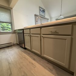 Coat by Coat Paint & Stain - Freshly sprayed kitchen cabinets