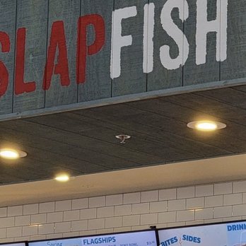 Slapfish - The menu in the restaurant - Digital menu screens displaying food items, prices, and images at Slapfish seafood restaurant in Albuquerque, NM. - Seafood Near Me - Albuquerque, New Mexico