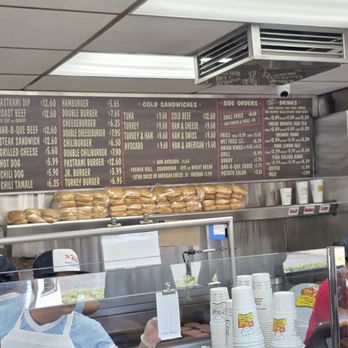 The Hat - The menu up top and workers making sandwiches and taking orders below - Sandwiches Near Me - Brea, California The Hat - The menu up top and workers making sandwiches and taking orders below - Sandwiches Near Me - Brea, California