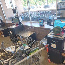 Aldi - Self checkout. They have two open lanes that are staffed by cashiers and eight self checkout lanes.