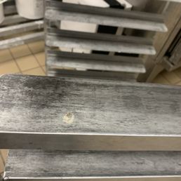  a close up of a bench in a kitchen