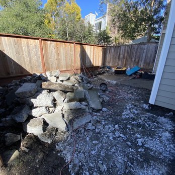 AJ's Landscaping - a pile of rocks in a backyard - Landscaping Near Me AJ's Landscaping - a pile of rocks in a backyard - Landscaping Near Me