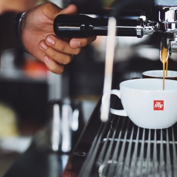 Dolan Coffee - a person pouring a cup of coffee - Coffee & Tea Near Me - Washington, DC, District of Columbia