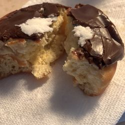 Dunkin' - No cream filling at all, even though there was a hole inserted into the donut where the white cream should have been. Complete rip off.