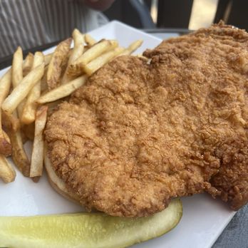 Fire By The Monon - Hoosier Breaded Pork Tenderloin Sandwich. - American Near Me - Indianapolis, Indiana