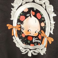 Ross Dress for Less - A black sweatshirt with a Kewpie doll.