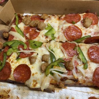 Little Caesars - NY deep dish - A rectangular pizza topped with pepperoni, sausage, green peppers, and onions, served in a cardboard pizza box. - Pizza Near Me - Globe, Arizona