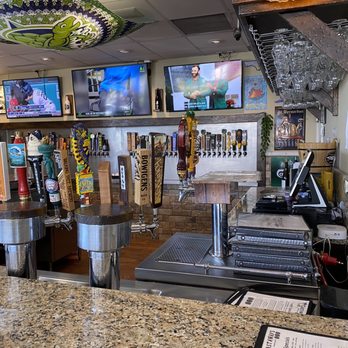 Castaways Gastropub - a bar with a counter and televisions - Gastropubs Near Me - Jensen Beach, Florida Castaways Gastropub - a bar with a counter and televisions - Gastropubs Near Me - Jensen Beach, Florida
