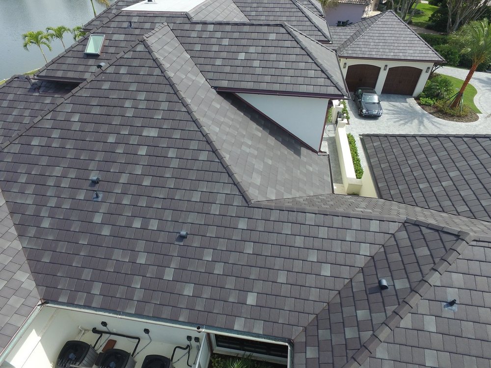 Slide of Excel Roofing Contractors