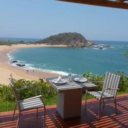 Travel Leaders/Jan's Travel & Cruise - A view from the seaside restaurant at Secrets Huatulco Mexico