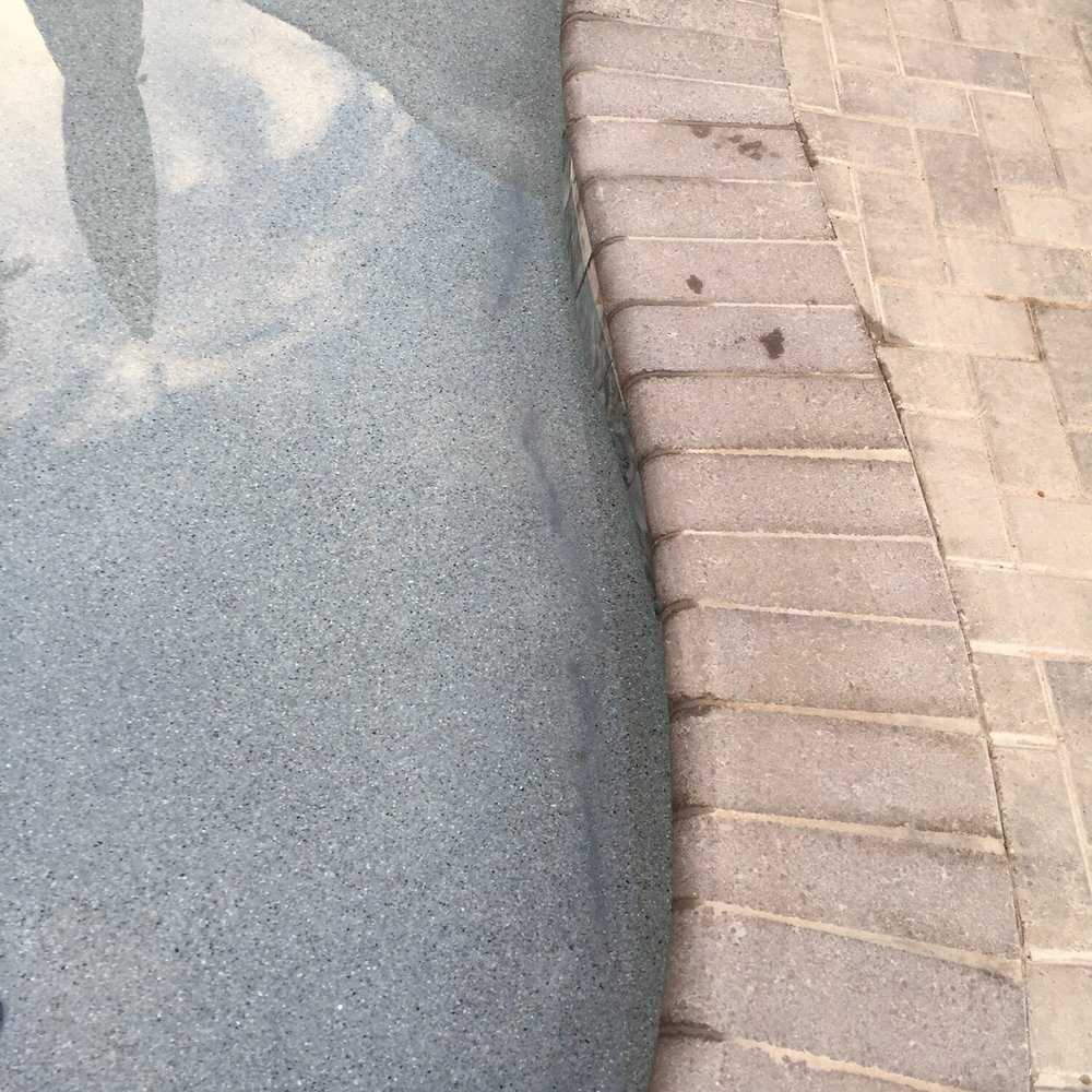 Cal Plastering - a reflection of a person walking on a sidewalk - General Contractors Near Me - Phoenix, Arizona Cal Plastering - a reflection of a person walking on a sidewalk - General Contractors Near Me - Phoenix, Arizona