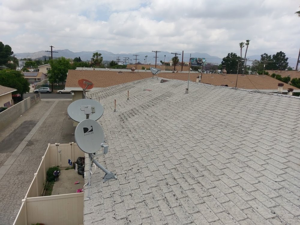 Slide of De Lorenzo's Guaranteed Roofing