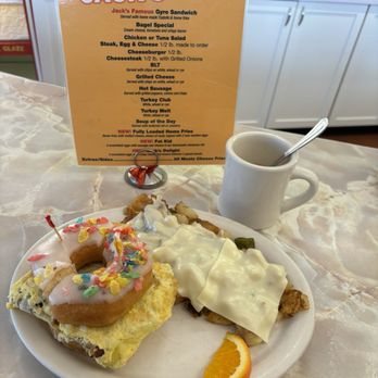 Jack's Donuts - Jack's Delight (with a fruity pebbles donut on top) and cheese home fries on the side. - Donuts Near Me - Laurel Springs, New Jersey