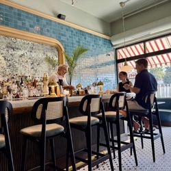 Ava June - The bar with Blaine behind it.