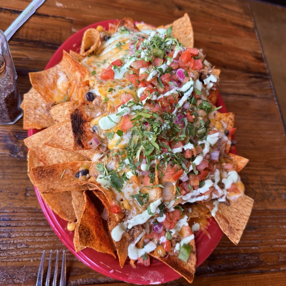 Tavern Grille - Nachos, good chips but the meat on them was pretty bland. - American Near Me - Murrieta, California
