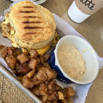 Third Space Coffee - Sausage egg and cheese biscuit - side of gravy and breakfast potatoes - Coffee & Tea Near Me - Bonner Springs, Kansas Third Space Coffee - Sausage egg and cheese biscuit - side of gravy and breakfast potatoes - Coffee & Tea Near Me - Bonner Springs, Kansas