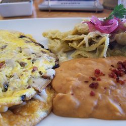 Panero Bistro - Special of the day. Mushroom and bacon omelet with chilaquiles verde..WHAT!