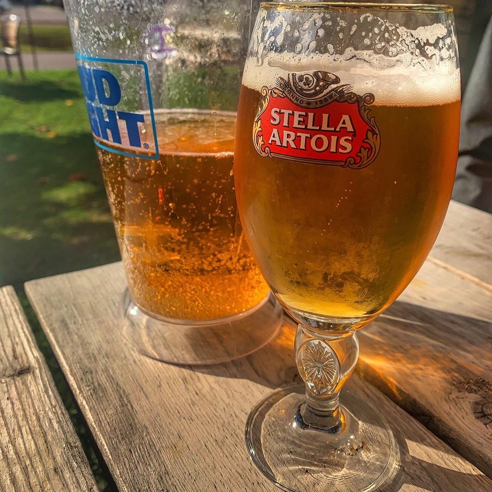 Boston Pizza - two glasses of beer on a picnic table - Pizza Near Me - Collingwood, Ontario