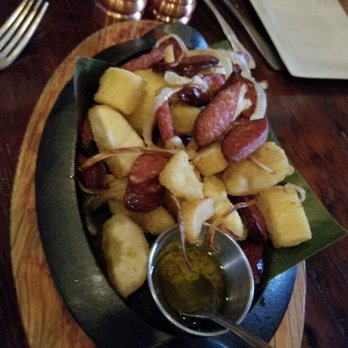 Samba Montclair - Fried yuca with pork sausage and sauteed onions app - Brazilian Near Me - Montclair, New Jersey Samba Montclair - Fried yuca with pork sausage and sauteed onions app - Brazilian Near Me - Montclair, New Jersey
