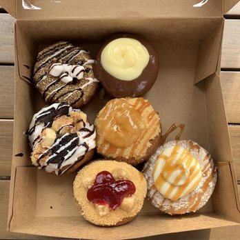 Destination Little Donuts - S'mores, Boston Cream, Oreo Cheesecake, Caramel Apple, Raspberry Cheesecake, Cinnamon Roll - Donuts Near Me - Destin, Florida Destination Little Donuts - S'mores, Boston Cream, Oreo Cheesecake, Caramel Apple, Raspberry Cheesecake, Cinnamon Roll - Donuts Near Me - Destin, Florida