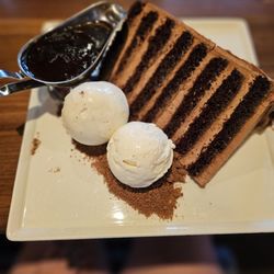TEN - Chocolate cake for 2 is HUGE. Warm chocolate fudge on the side is such a great addition. The cake has a subtle amaretto flavor.