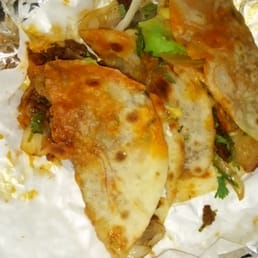 Extremely salty and overly greasy tacos de al pastor Extremely salty and overly greasy tacos de al pastor