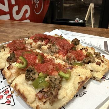 DNY Pizzeria - Detroit vegan pizza with peppers and onions and house made vegan cheese and vegan peppers - Pizza Near Me - Fort Lauderdale, Florida DNY Pizzeria - Detroit vegan pizza with peppers and onions and house made vegan cheese and vegan peppers - Pizza Near Me - Fort Lauderdale, Florida