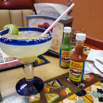 Fiesta Charra - a margarita in a glass with a straw and lime - Mexican Near Me - Eaton, Ohio Fiesta Charra - a margarita in a glass with a straw and lime - Mexican Near Me - Eaton, Ohio