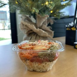 Poke Bowl with aloha tuna poke, kimchi, seaweed salad and seafood louie Poke Bowl with aloha tuna poke, kimchi, seaweed salad and seafood louie