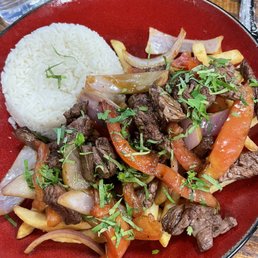 Traditional lomo saltado. Addicting sauce!