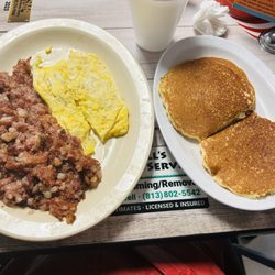 Martha's Family Restaurant - Two eggs and corned beef hash. Pancakes is one of the side options.