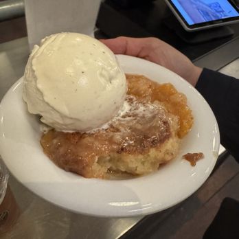 Joe's Real BBQ - Peach cobbler with ice cream - Barbeque Near Me - Gilbert, Arizona Joe's Real BBQ - Peach cobbler with ice cream - Barbeque Near Me - Gilbert, Arizona